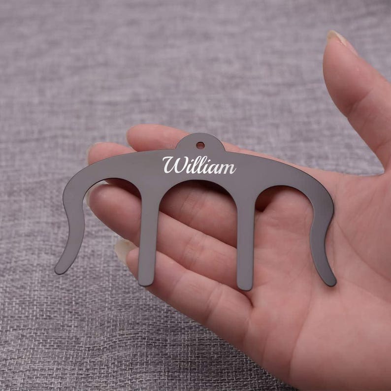 May include: Black metal music stand with the name "William" engraved on it.