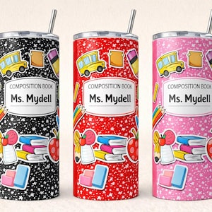 May include: Three stainless steel tumblers with school-themed designs. Each tumbler features a composition book design with the text "COMPOSITION BOOK Ms. Mydell". The designs include school buses, pencils, books, and apples. One is black, one is red, and one is pink.