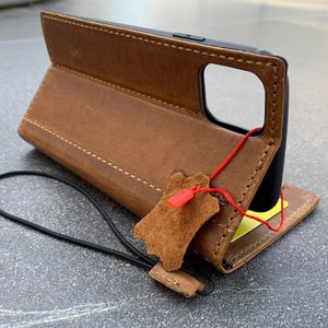 Funda de piel auténtica para Apple iPhone 11 PRO MAX, funda tipo cartera, color bronceado, con correa de carga inalámbrica, clásica, de goma, fina, de lujo, para identificación