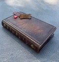 Handmade Leather iPhone Wallet Case: Vintage Book CoverChristmas gift product logo