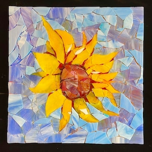Sunflower mosaic wall art; stained glass on box canvas is ready to hang; Light shades of blue surround sunflower; one of a kind glass art