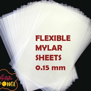 May include: A stack of 20 clear, flexible mylar sheets, 0.15 mm thick. The sheets are translucent and have a smooth, glossy finish.  The text "FLEXIBLE MYLAR SHEETS 0.15 mm" is printed in red on the top sheet.