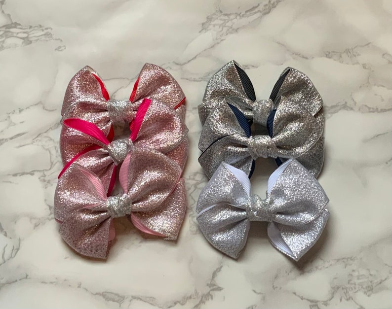 Glitter bow on a beak clip 10cm