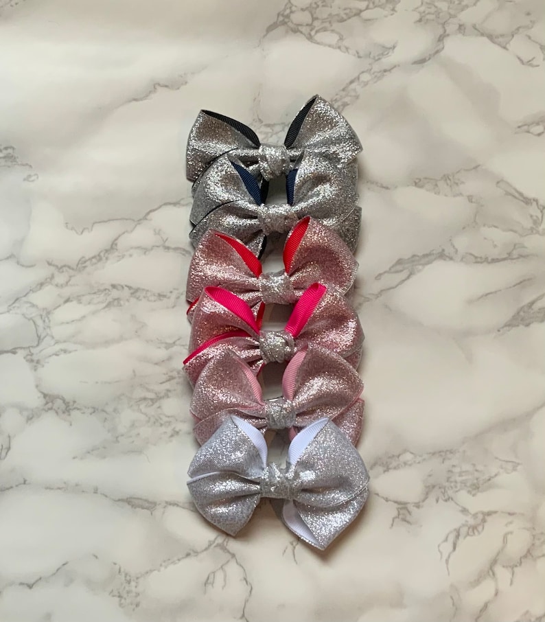 Glitter bow on a beak clip 10cm
