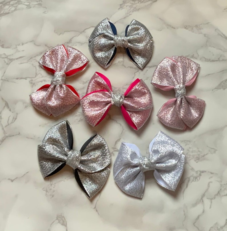 Glitter bow on a beak clip 10cm