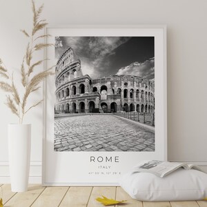 May include: Black and white photograph of the Colosseum in Rome, Italy. The text "ROME ITALY 41&deg; 53' 53" N, 12&deg; 29' 29" E" is printed below the image.