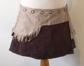 Adjustable wrap double sided miniskirt in mix fabrics.