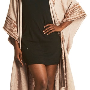 Simple square poncho with high neck made from acrylic shawls. image 8