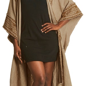 Simple square poncho with high neck made from acrylic shawls. image 5