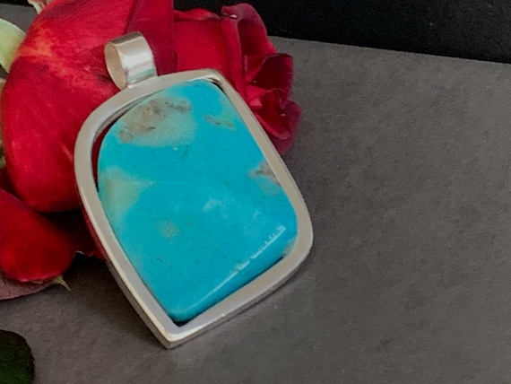 Real turquoise pendant in silver (925) sterling