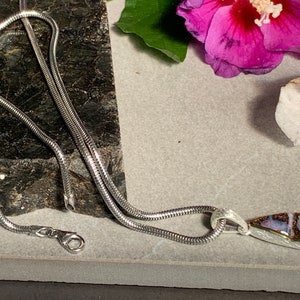 Boulder Opal (Australia) pendant with silver and gold-plated edge