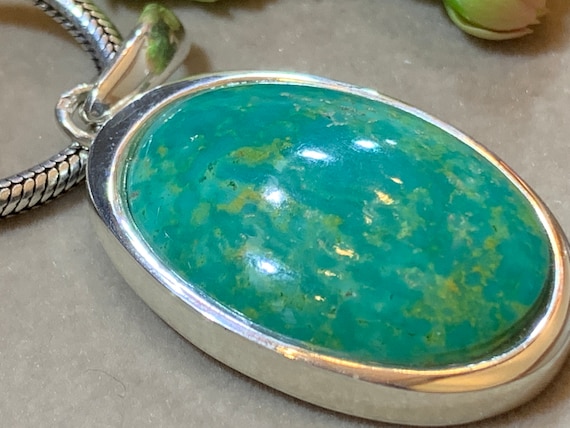 Real turquoise pendant in silver (925) sterling