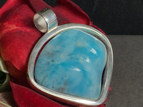 Very nice Larimar Pendant in an extravagant design with silver (925) sterling.