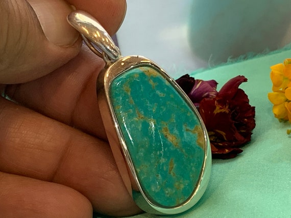Real turquoise pendant in silver (925) sterling