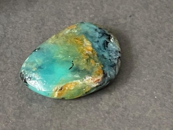 Boulder Opal (Australia) pendant with silver and gold-plated edge