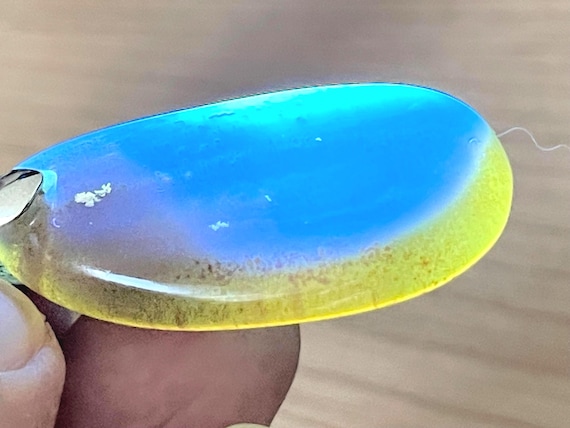 Phenomenal, rare blue amber