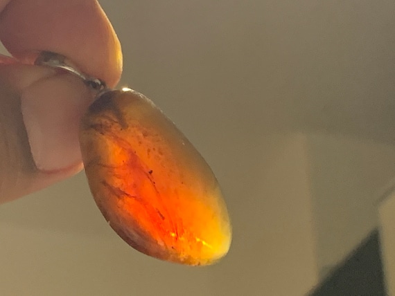 Phenomenal, rare blue amber pendant with sterling silver (925)