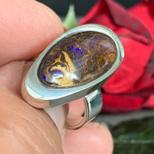 Quite an unusual, beautiful boulder opal ring set in sterling silver (925).