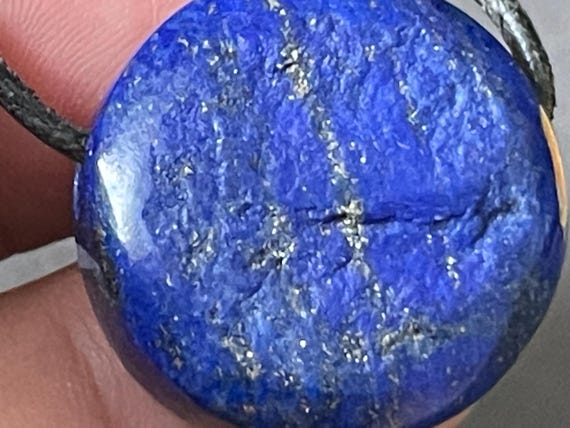 Genuine lapis lazuli pendant drilled, round
