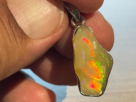Genuine, precious opal from Africa set in 925 silver