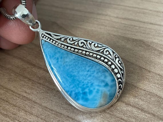 Very nice Larimar Pendant in an extravagant design with silver (925) sterling.