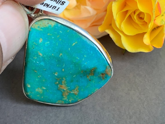 Real turquoise pendant in silver (925) sterling
