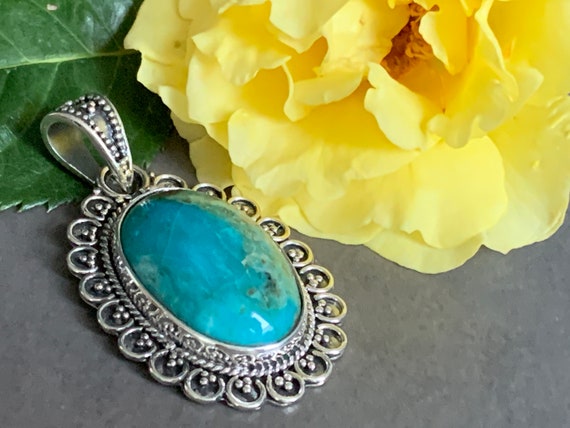 Real turquoise pendant in silver (925) sterling