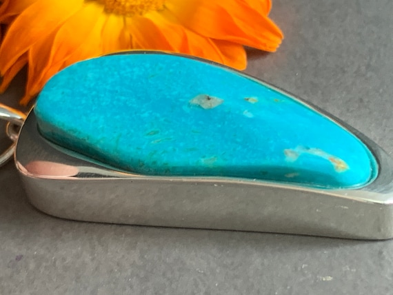 Real turquoise pendant in silver (925) sterling