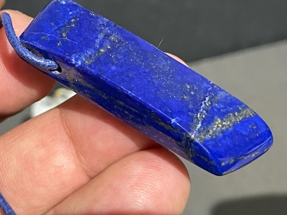 Elegant drilled lapis lazuli pendant – deep blue gemstone with a regal aura, unique natural stone for jewelry & gifts