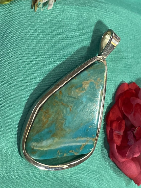 Real turquoise pendant in silver (925) sterling