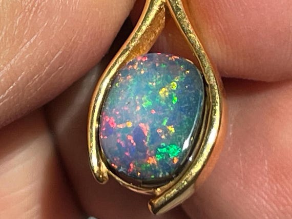 Genuine precious opal from Africa in 925 Sterling silver gold-plated, pictures mostly in natural sunlight