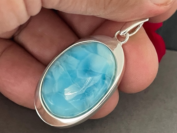 Very nice Larimar Pendant in an extravagant design with silver (925) sterling.