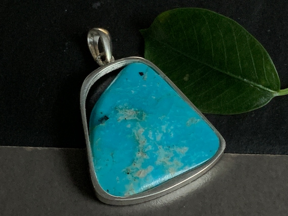 Real turquoise pendant in silver (925) sterling