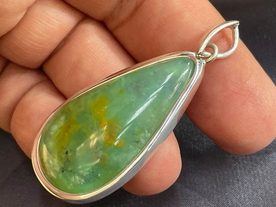 Boulder Opal (Australia) pendant with silver and gold-plated edge
