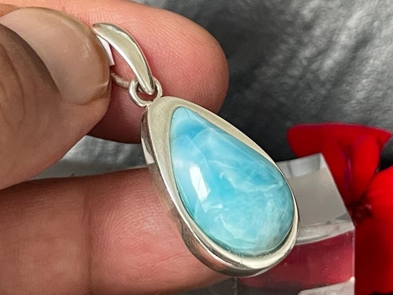 Very nice Larimar Pendant in an extravagant design with silver (925) sterling.