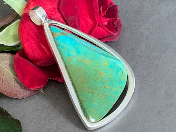 Real turquoise pendant in silver (925) sterling