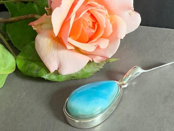Very nice Larimar Pendant in an extravagant design with silver (925) sterling.