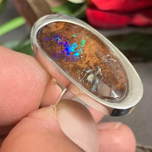 Quite an unusual, beautiful boulder opal ring set in sterling silver (925).