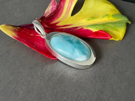 Very nice Larimar Pendant in an extravagant design with silver (925) sterling.