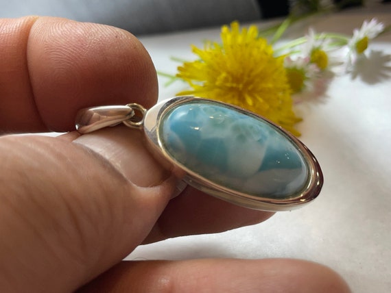 Very nice Larimar Pendant in an extravagant design with silver (925) sterling.