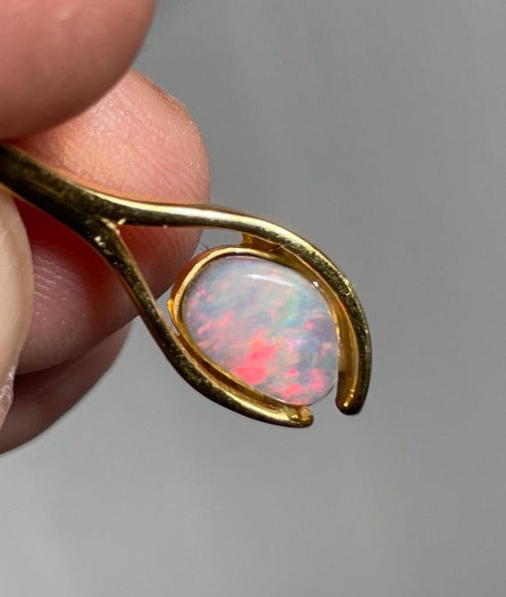 Genuine precious opal from Africa in 925 Sterling silver gold-plated, pictures mostly in natural sunlight