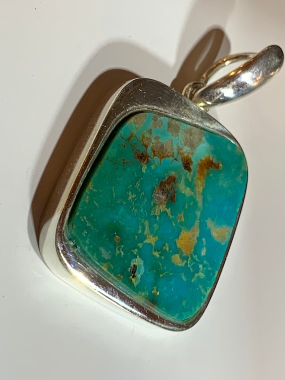 Real turquoise pendant in silver (925) sterling