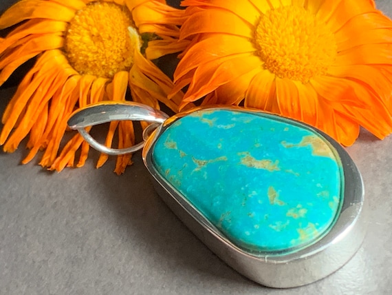 Real turquoise pendant in silver (925) sterling