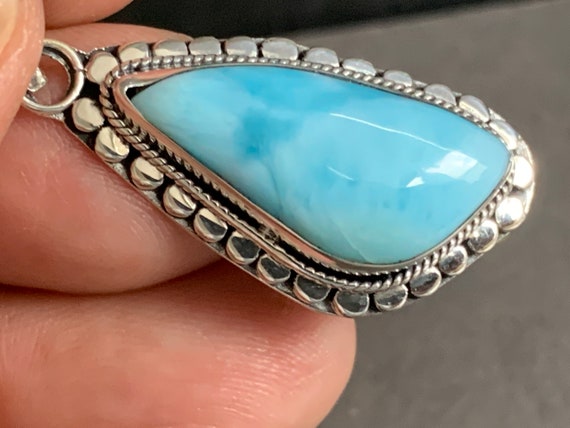 Very nice Larimar Pendant in an extravagant design with silver (925) sterling.
