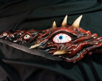 Espada EGO Mimética. Biblioteca de Ruina y Corporación Lobotomía, Gebura, también conocida como Arma de Niebla Roja.