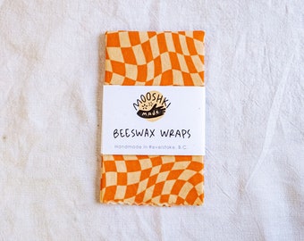 Beeswax Wrap - 'Tipsy Orange Checkers'- Handmade in Canada - Printed Cotton, Local Beeswax, Pine Resin, Jojoba Oil. Reusable, Biodegradable.