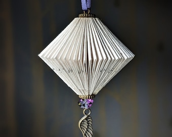 Folded book paper hanging ornament with angel wing