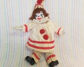 Vintage Porcelain Clown Doll Taiwan Bendable Arms Legs Red White Painted Face Yarn Hair Circus Amusement Figurine