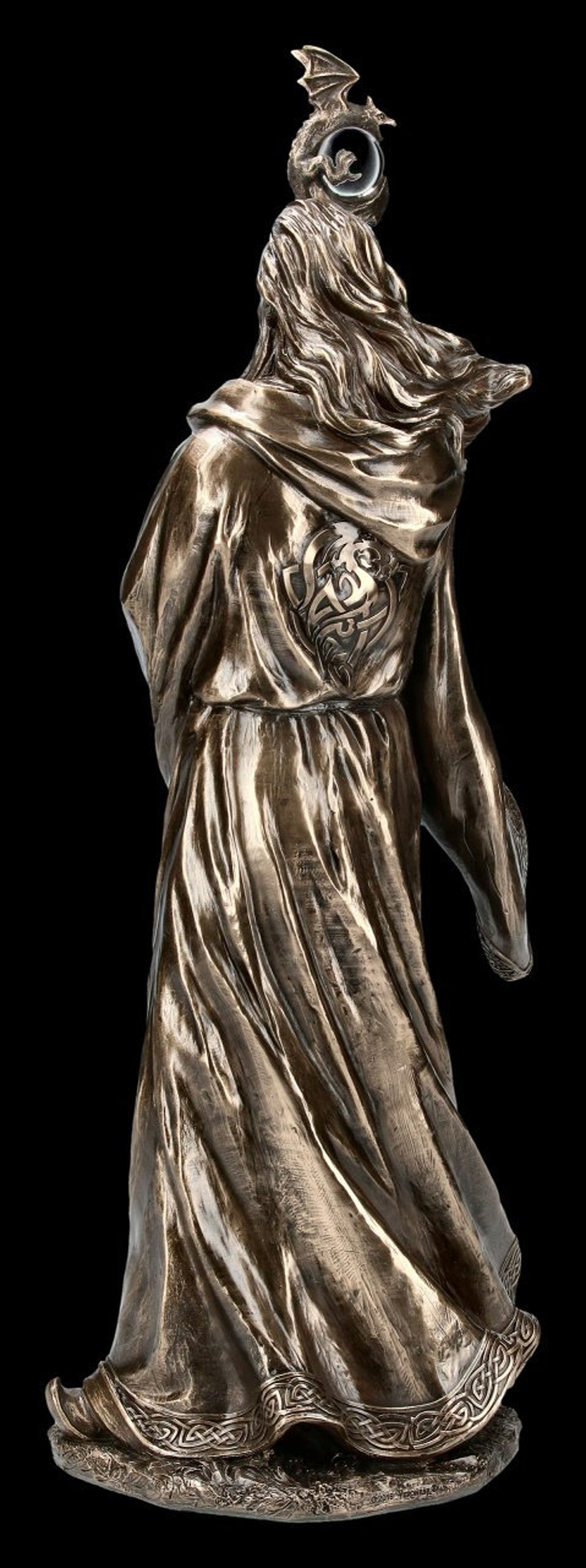 seven deadly sins merlin statue