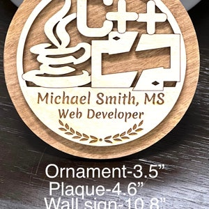 May include: A wooden plaque with a C++ logo, a coffee cup, and the text "Michael Smith, MS Web Developer". The plaque is available in three sizes: 3.5 inches, 4.6 inches, and 10.8 inches.